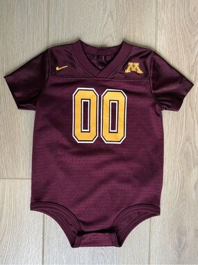 Nike Kids Maroon Bodysuit with Gold Detailing